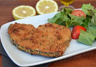 Cotoletta di pesce spada con rucola e pomodorini datterini