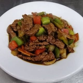 79. Ternera con salsa de ostras