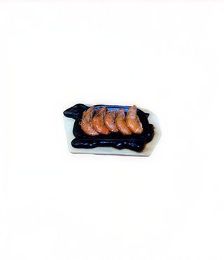 Langostinos en bandeja quemada