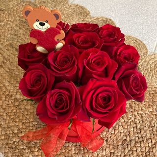 Caixa de rosas vermelhas