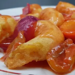 57. Gambas agridulces
