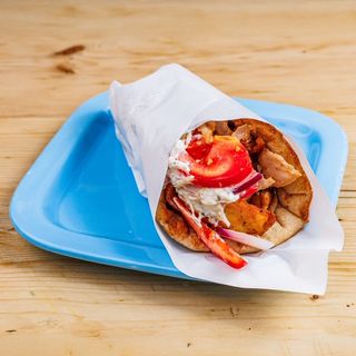 Ghyros di pollo o di maiale al cartoccio