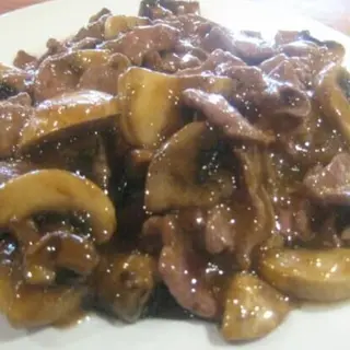 70. Ternera Con Champiñón