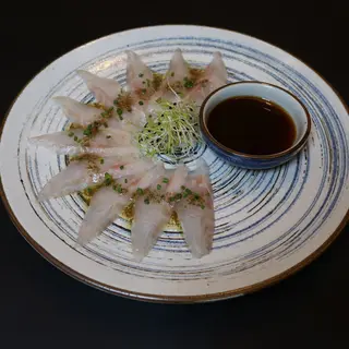 SA8- Sashimi de Lubina Con Trufa 