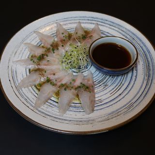 SA8- Sashimi de Lubina Con Trufa 