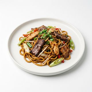 Fideos fritos con pollo