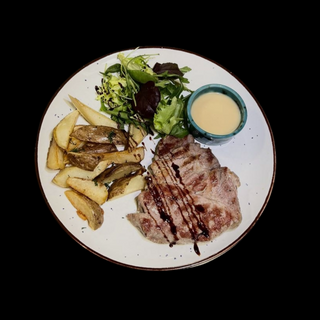 Стейк з свинного ошийка з медово-гірчичним соусом