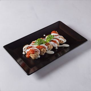 Polpettine al ragù con fonduta di grana