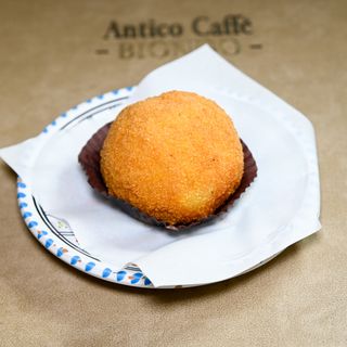 Arancine con mortadella e pistacchio
