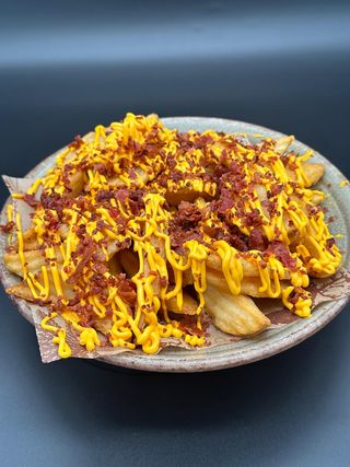 Patatine cheddar e bacon