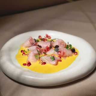Tiradito mixto de salmón y shiromi 