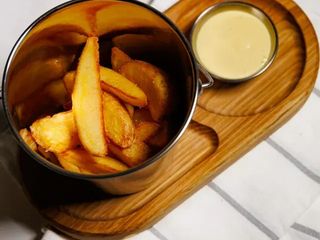 Картопляні дольки з гірчичним дресингом (180/50g)