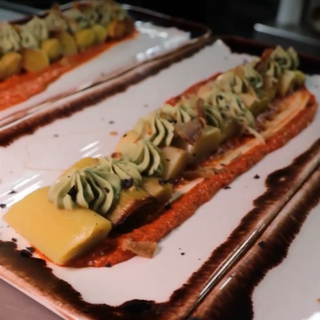 Puerro a baja temperatura con romesco