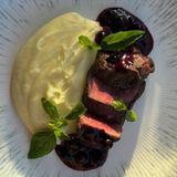 Fillet mignon with black currant sauce and puree