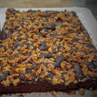 Coca de 100% Cacao y nueces. Ración de 100 grs.