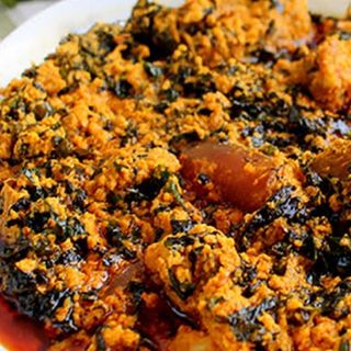 Egusi mixed with a chunk of nile perch fillet 