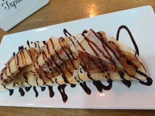 Tosta De Presa Con Cebolla Caramelizada Y Queso Manchego  (1/2 Ración)