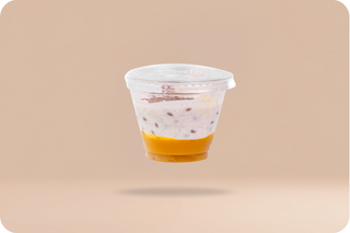 Jogurt z nasionami siemienia, ostropestem i musem mango