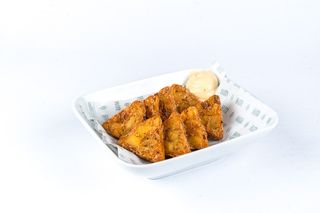 Triangolini di rösti con speck - 8 pezzi