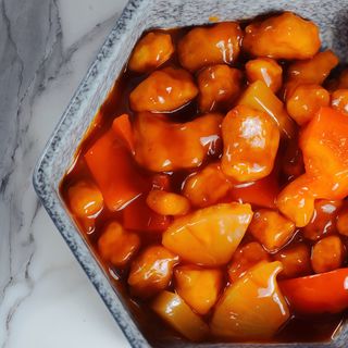 Maiale in Salsa Kuleiu Agrodolce