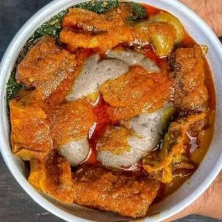 Amala served with ewedu mixed with cowleg