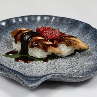 100.- Sushi Anguila