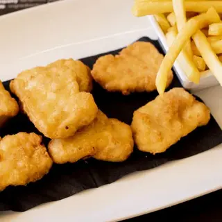 Nuggets De Pollo Con Patatas Fritas