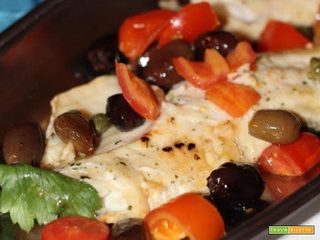 Filetto di branzino con porcini e pomodorini