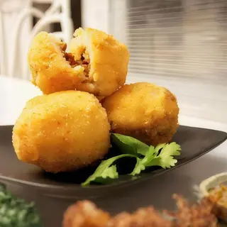 Ración De Patatas Rellenas (6 Uds.)