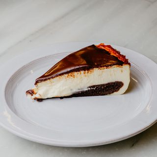 Porcion De Tarta Cheesecake Con Chocolate