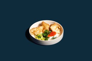 Блины со взбитым каймаком и красной икрой