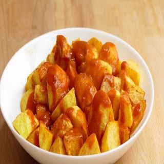 Patatas bravas (porción)