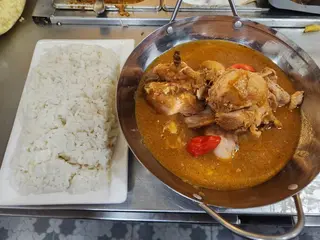 Kédjénou De Poulet ( demi ) + Riz