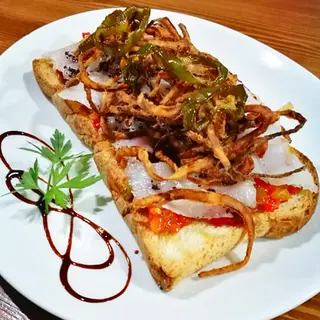 Tostada De Bacalao Marinado