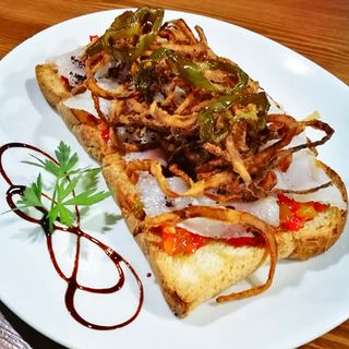 Tostada De Bacalao Marinado