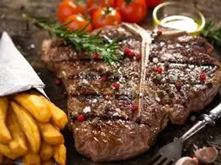 Côte À L'os 600 G Sauté À L'ail Et Romarin