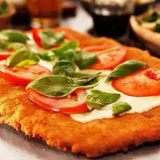 MILANESA CAPRESE CON GUARNICION (1 sola a eleccion)