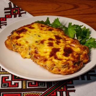 Schnitzel with cheese and mushrooms