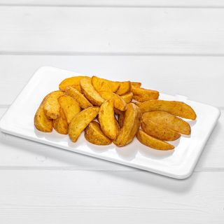 Картофель по-деревенски (130 гр.)