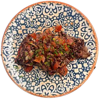 Tagliata di black angus con radicchio, pomodorini e gorgonzola