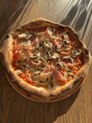 Prosciutto e funghi cotto