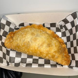Empanada pollo alla cipolla verde