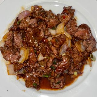 Ternera con cebolla 