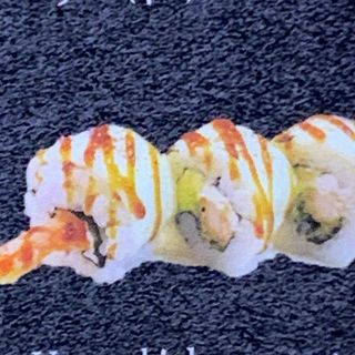  177 Uramaki de aguacate con langostino y queso flameado (8 pzs.)