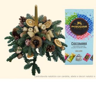 Centro tavola con decori e candela con cioccolatini