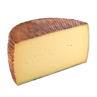 Manchego Curado Cuña 300gr.