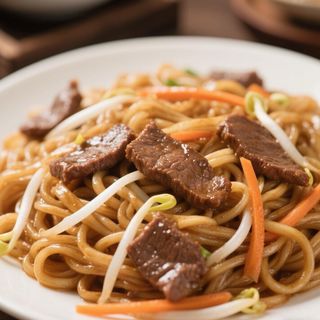 33. Spaghetti saltati con manzo