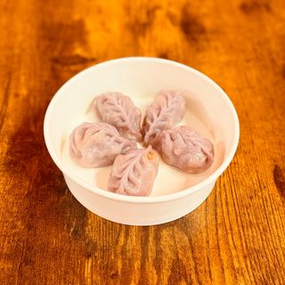 Ravioli di maiale e mais