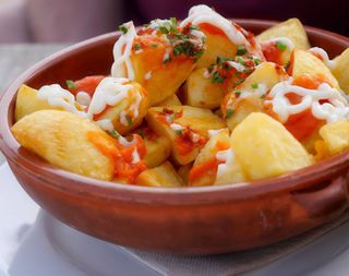 7. Patatas Bravas (Ración)