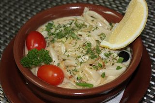 Кальмары тушёные в сметане